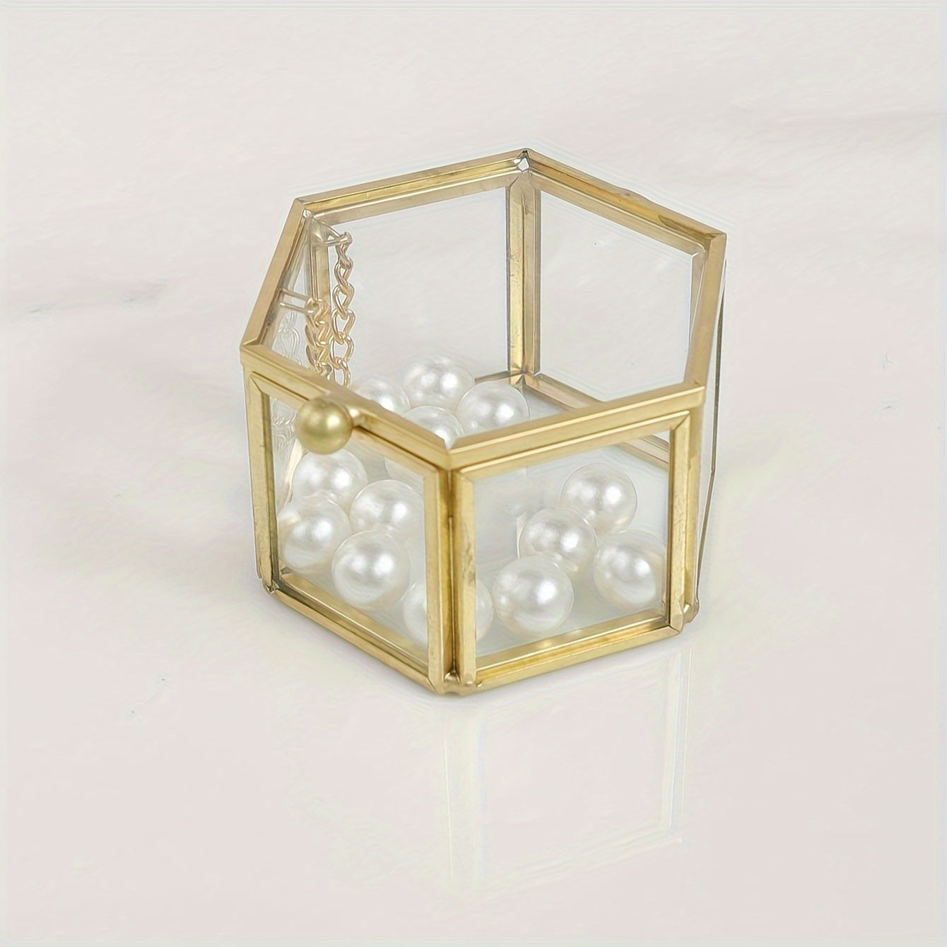 boîte à bijoux en verre et métal doré
